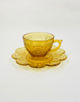 ANTIQUE AMBER PRESSED GLASS TEA CUP & SAUCER