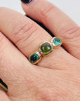 1970s 10K ROSE GOLD TRILOGY RING WITH EMERALD & PERIDOT CABOCHON