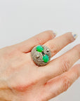 ANTIQUE SILVER RING WITH EMERALD CABOCHON AND FILIGREE DOME