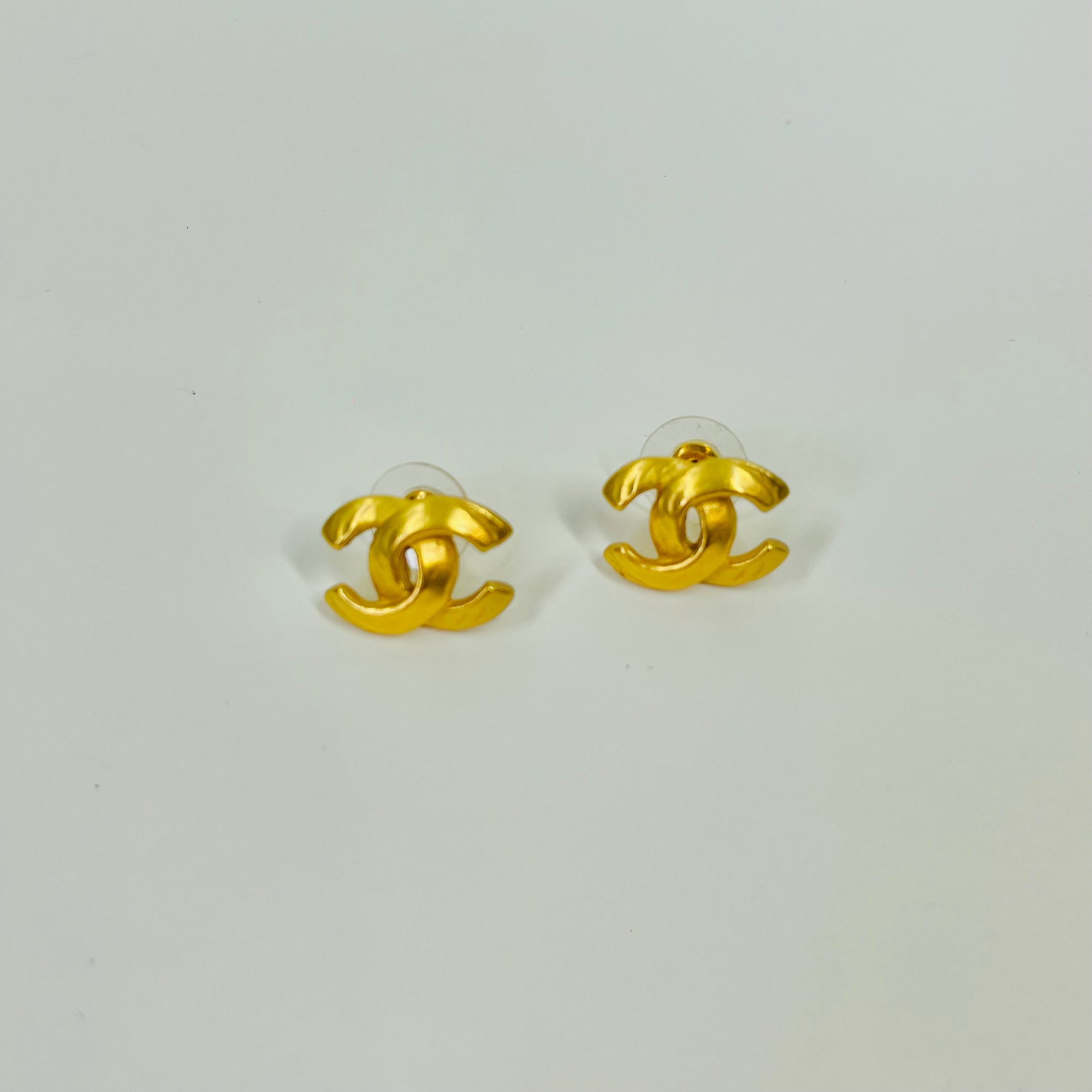 Y2K CHANEL CC BRUSHED GOLD LOGO PIERCED EARRINGS