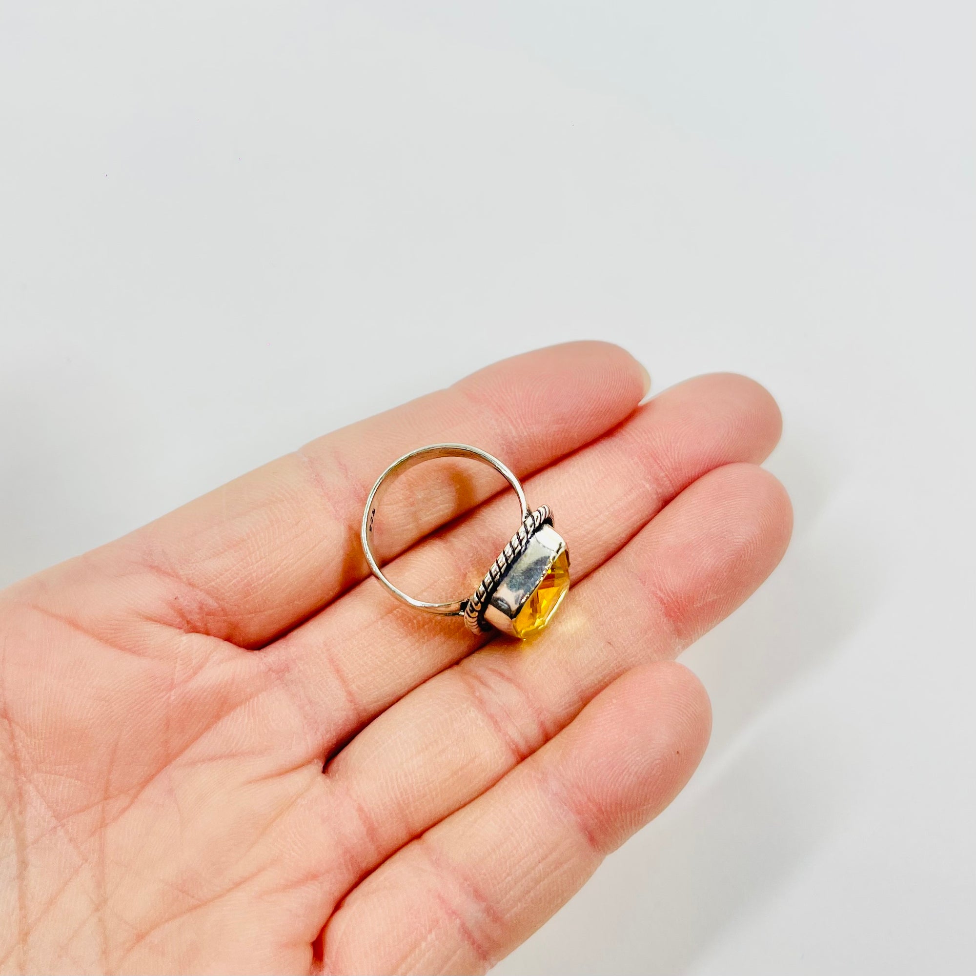 ANTIQUE SILVER RING WITH EMERALD CUT CITRINE