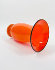 ANTIQUE CASED ORANGE GLASS POSY VASE WITH BLACK RIM
