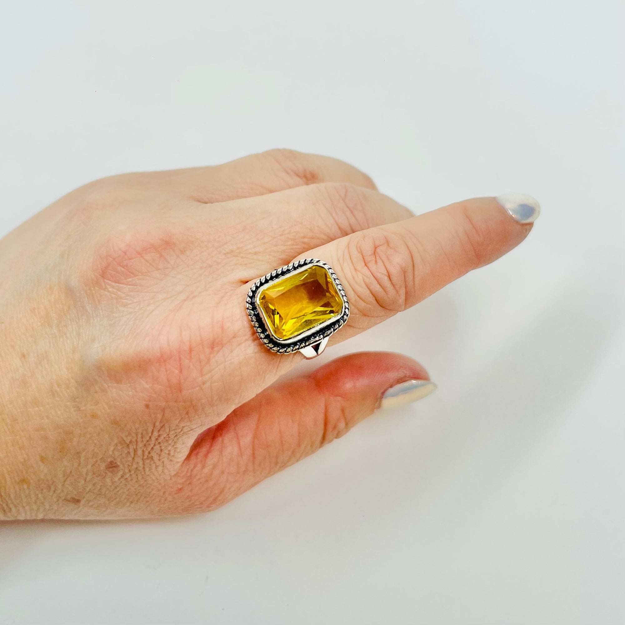 ANTIQUE SILVER RING WITH EMERALD CUT CITRINE