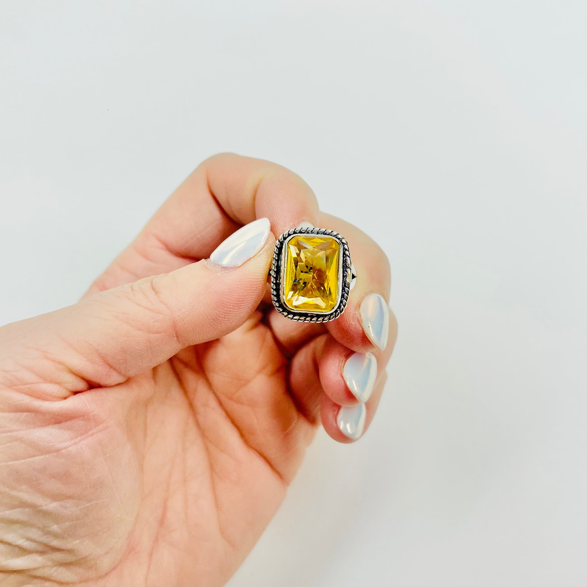 ANTIQUE SILVER RING WITH EMERALD CUT CITRINE