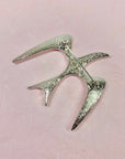 1980s SARAH COVENTRY STAINLESS STEEL BIRD BROOCH