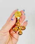 1995 CHANEL CC LOGO PEARL DROP INFINITY KNOT CLIP ON EARRINGS