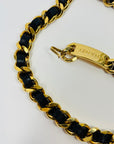 1980s CHANEL BLACK LEATHER GOLD PLATED LOGO BELT