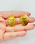 1990s CHANEL OVAL GOLD LOGO CLIP ON EARRINGS