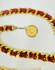 1980s CHANEL RED/BURGUNDY LEATHER GOLD PLATED LOGO BELT