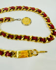 1980s CHANEL RED/BURGUNDY LEATHER GOLD PLATED LOGO BELT
