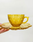 ANTIQUE AMBER PRESSED GLASS TEA CUP & SAUCER