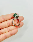 ANTIQUE SILVER RING WITH ELABORATE JADE BEAD