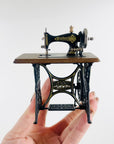 VINTAGE MINIATURE SEWING MACHINE & MANNEQUIN