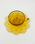 ANTIQUE AMBER PRESSED GLASS TEA CUP & SAUCER