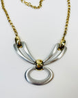 1960s BRUTALIST NECKLACE WITH STAINLESS STEEL BOW PENDANT