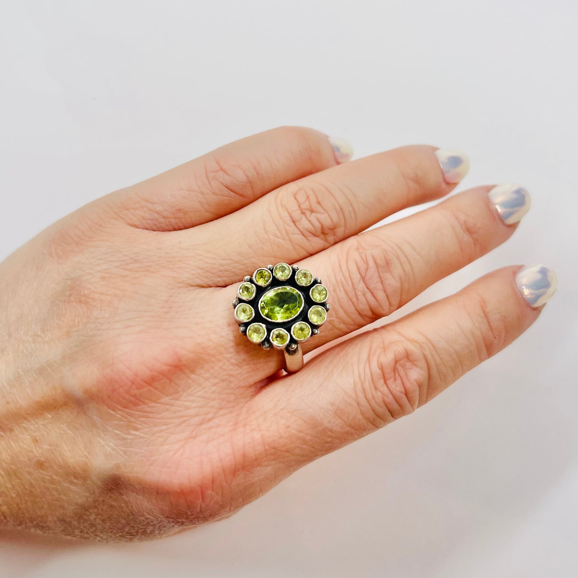 ANTIQUE SILVER PERIDOT HALO RING