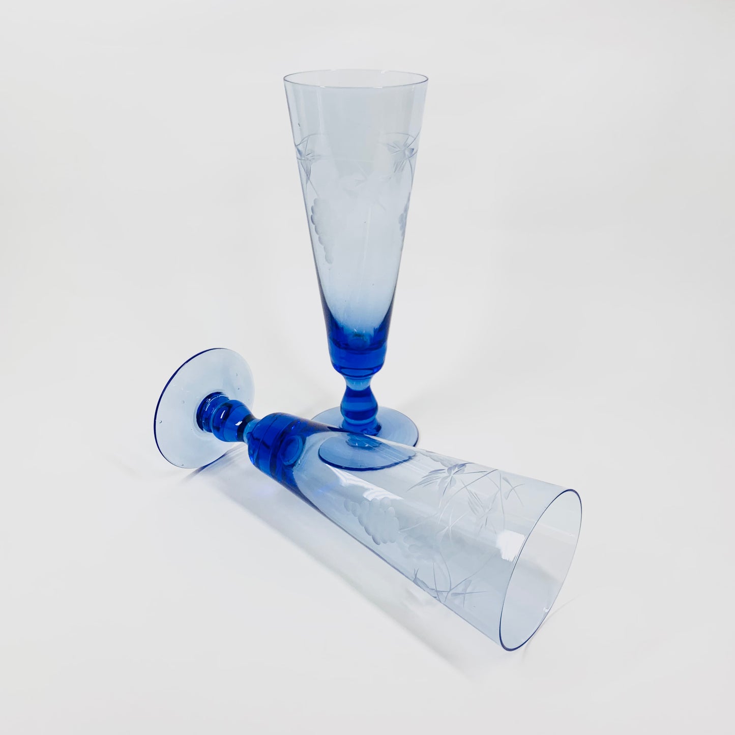 1940s blue etched vine pattern glass champagne flutes