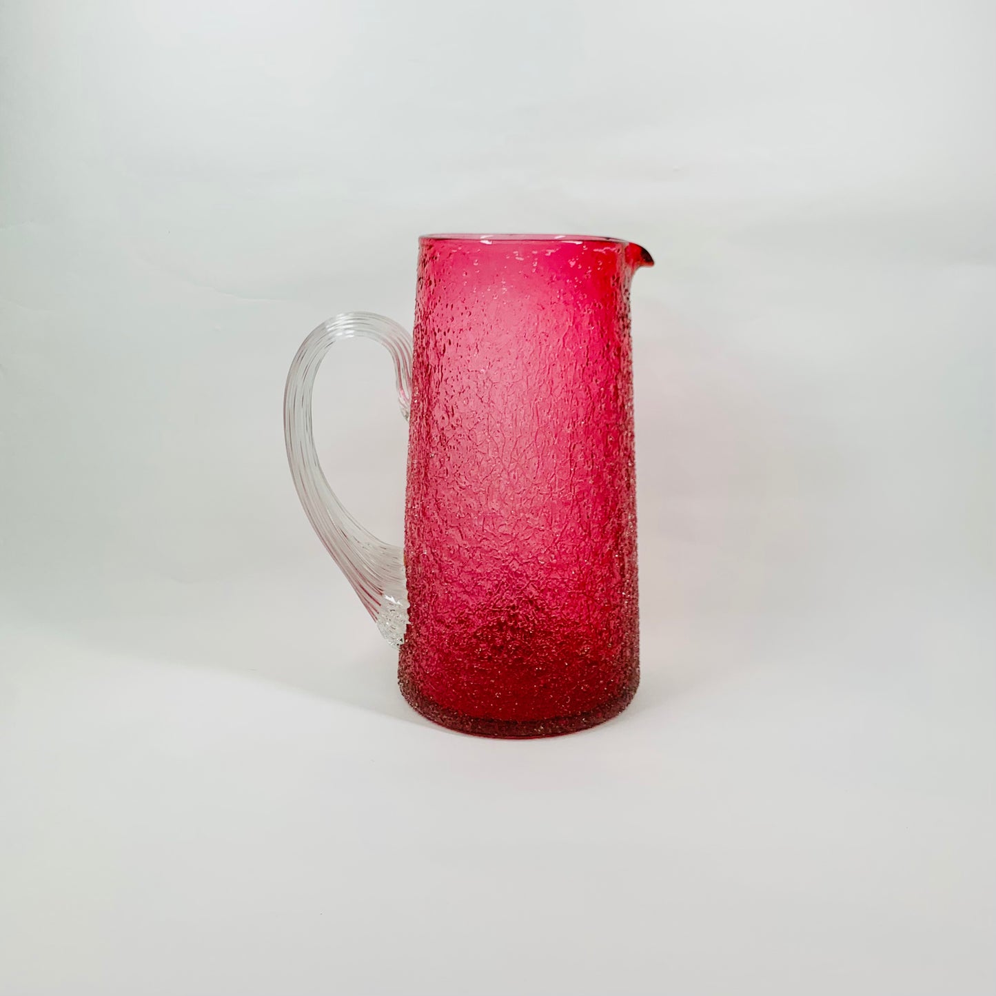 Antique Victorian cranberry crackle glass jug with clear handle