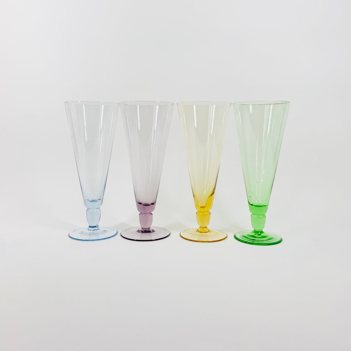 Midcentury harlequin glass champagne flutes