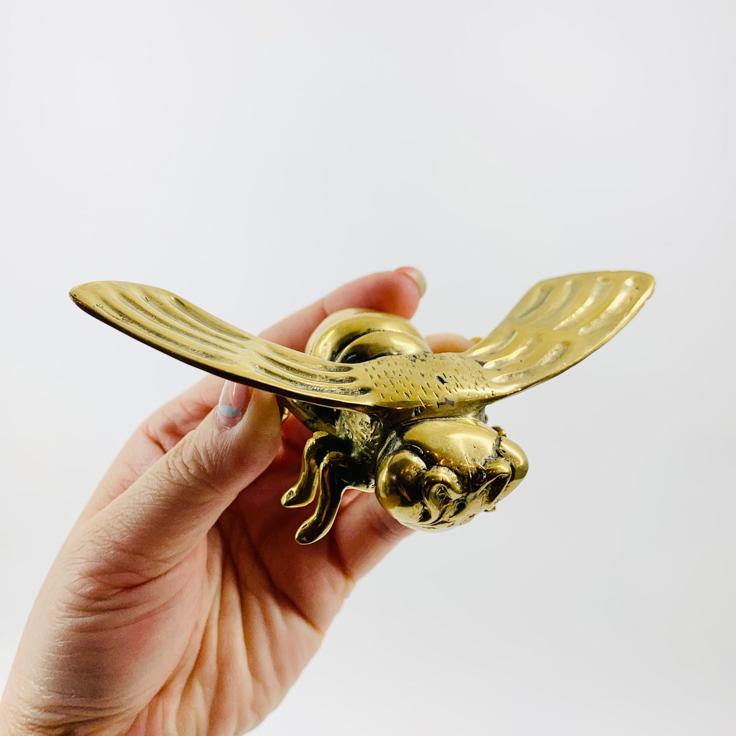 Antique brass bee