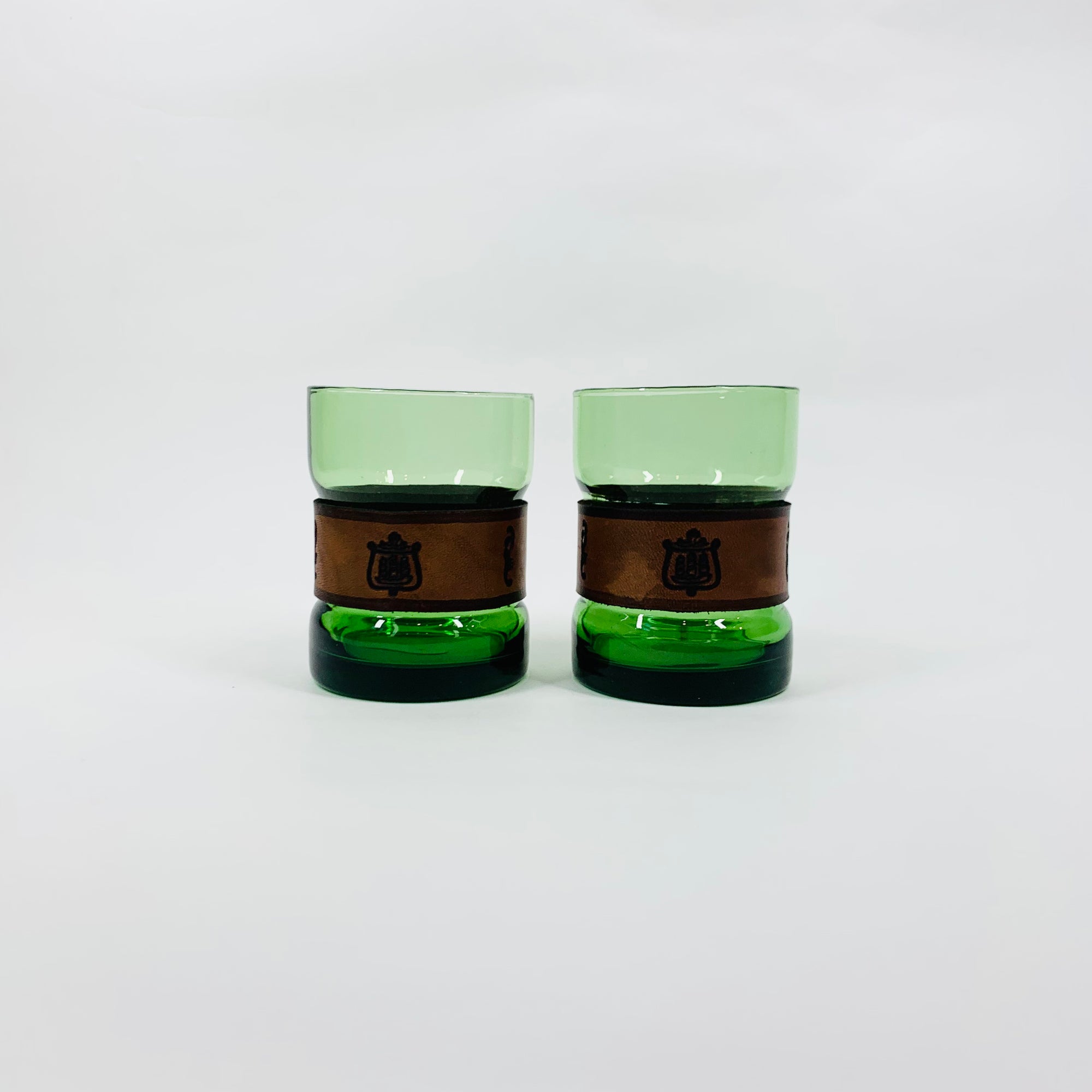Rare Midcentury Italian green glass set with detachable leather sleeves