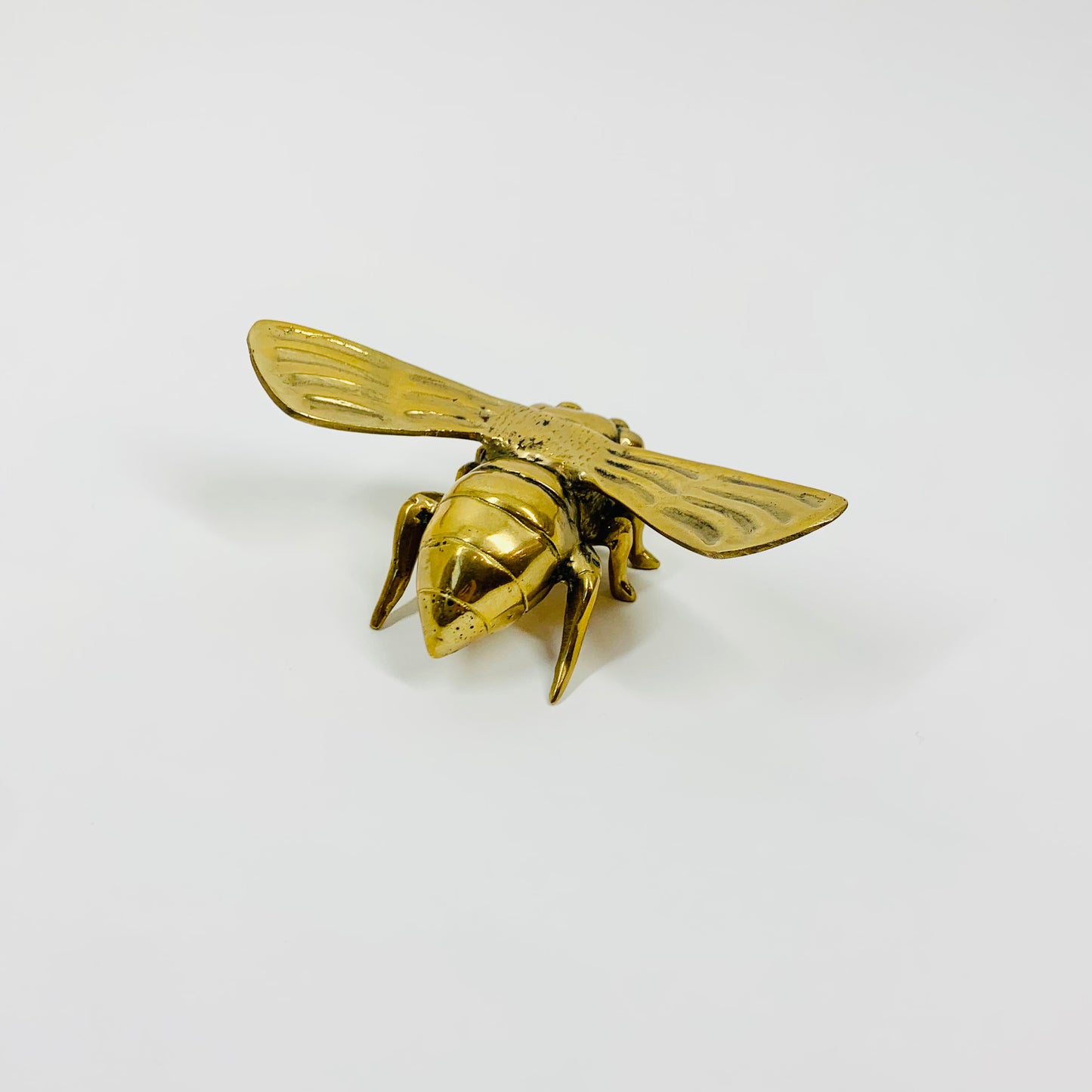 Antique brass bee