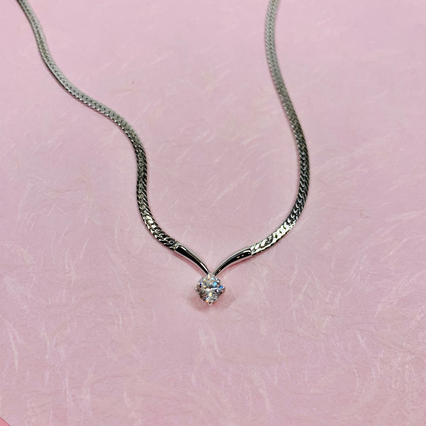 1980s Avon costume silver plated necklace with solitaire chevron pendant