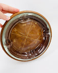 Large MCM gold embossed leather sleeve glass ashtray