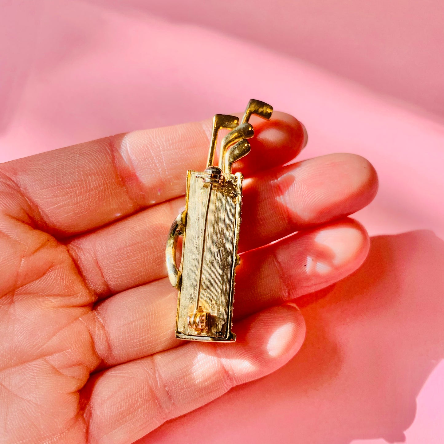 1980s gold plated golf caddy brooch with rhinestone
