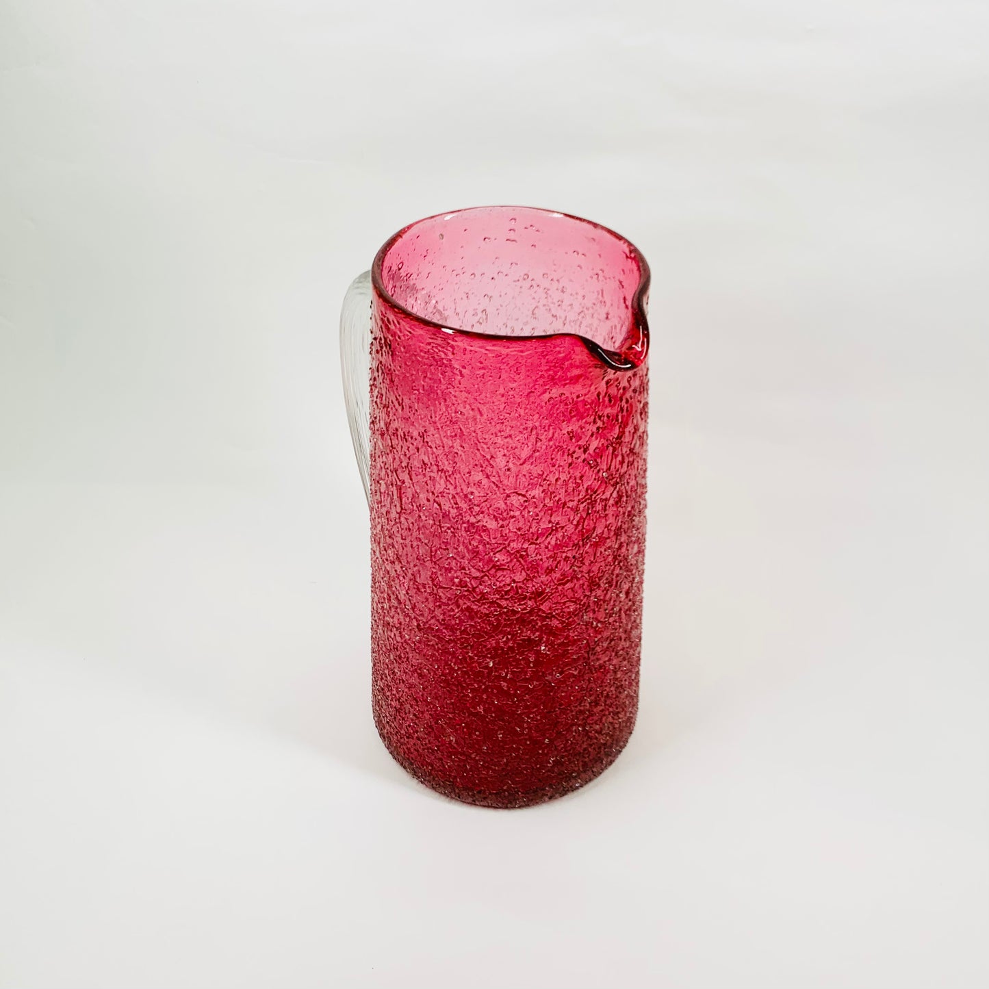 Antique Victorian cranberry crackle glass jug with clear handle