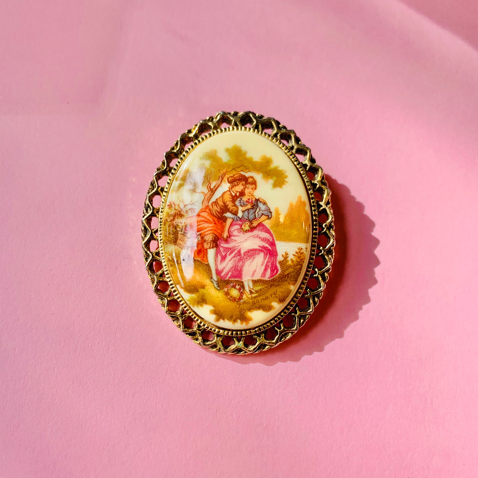 Antique hand painted Limoges porcelain brooch with filigree edge