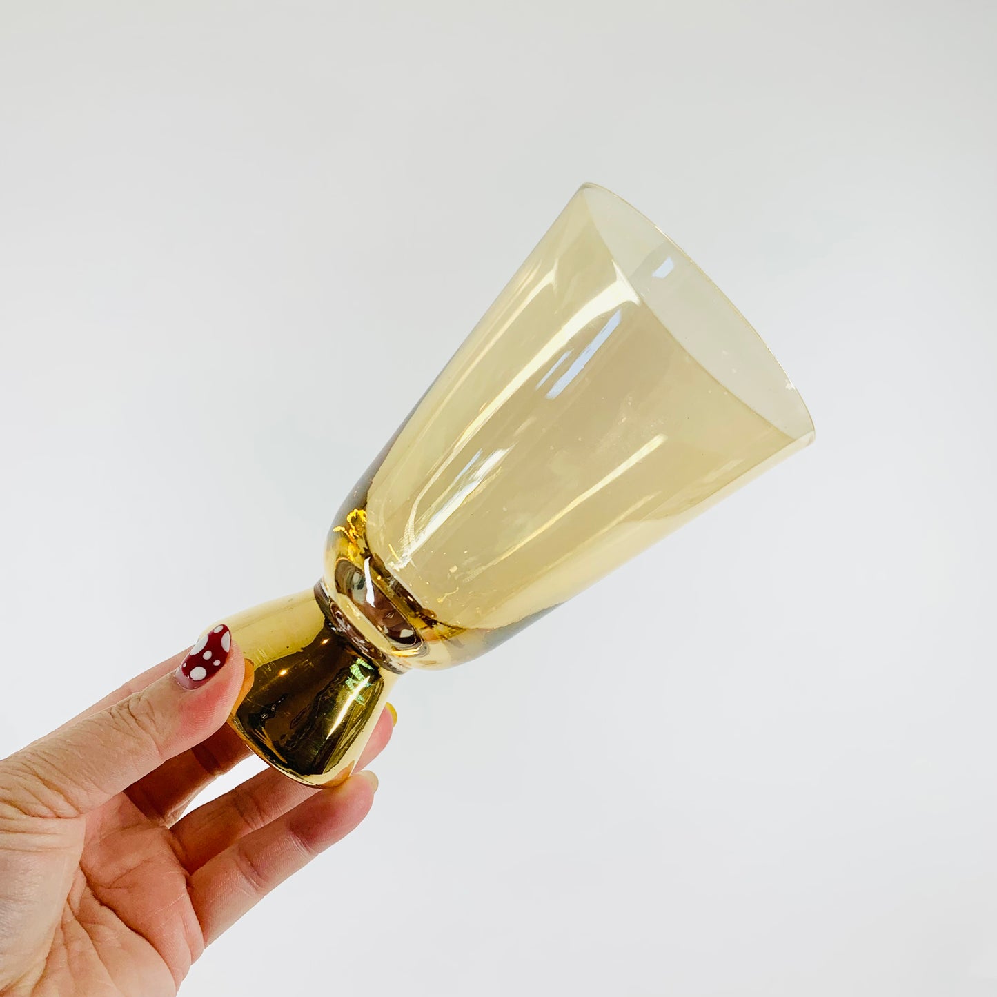 Midcentury iridescent footed harlequin glasses