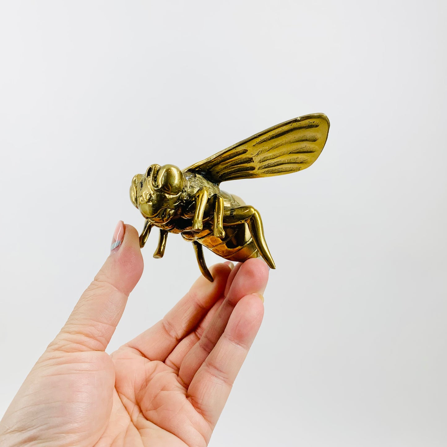 Antique brass bee