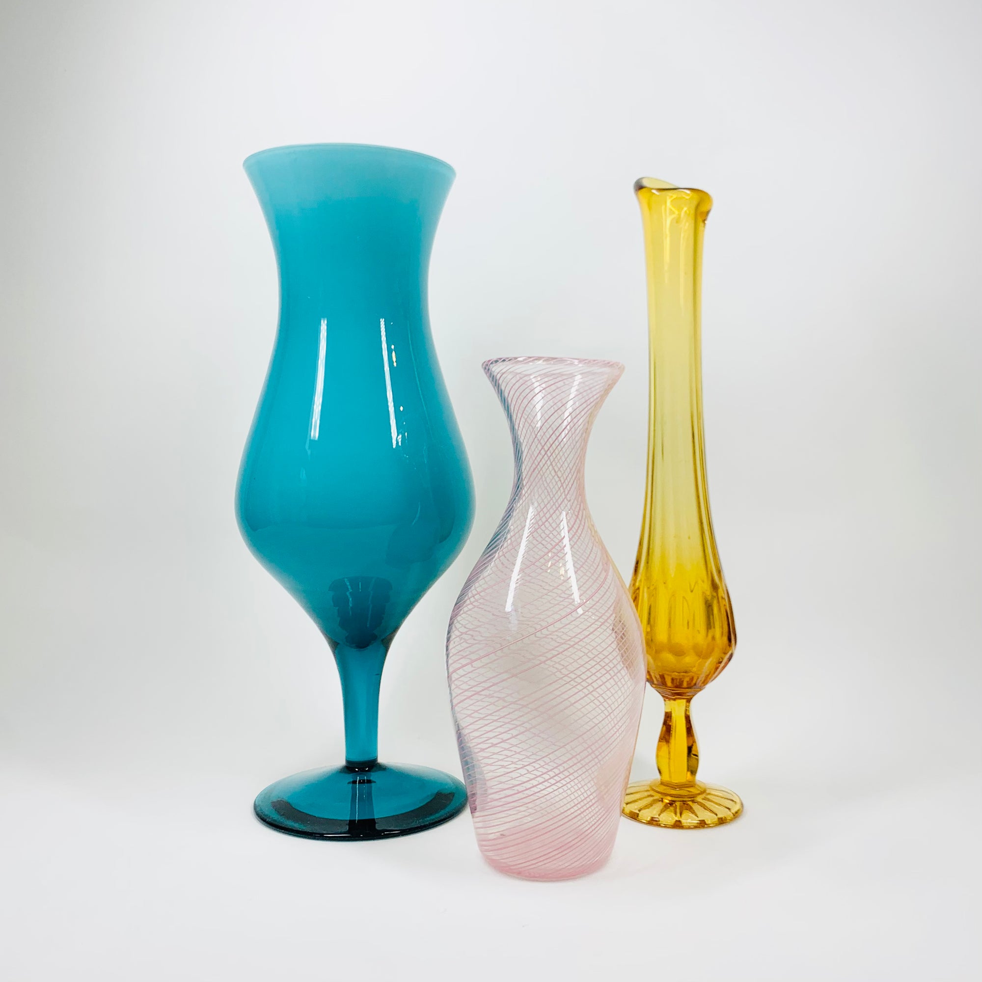 Midcentury footed Italian Empoli cased aquamarine glass vase