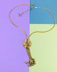 Rare 1970s Anson American triple plated gold necklace with floral tassel pendant