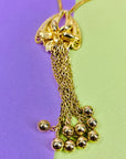 Rare 1970s Anson American triple plated gold necklace with floral tassel pendant