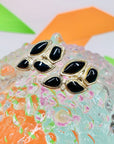 1960s statement silver nickel black enamel clip on earrings
