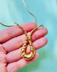 1970s Avon gold plated flat link necklace with rhinestones pendant