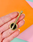 Rare 1950s gold plated banjo brooch with rhinestone