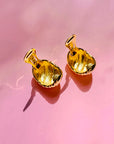 1960s Barcs triple gold plated ribbed cocoon clip on earrings by Monet