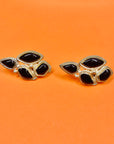 1960s statement silver nickel black enamel clip on earrings