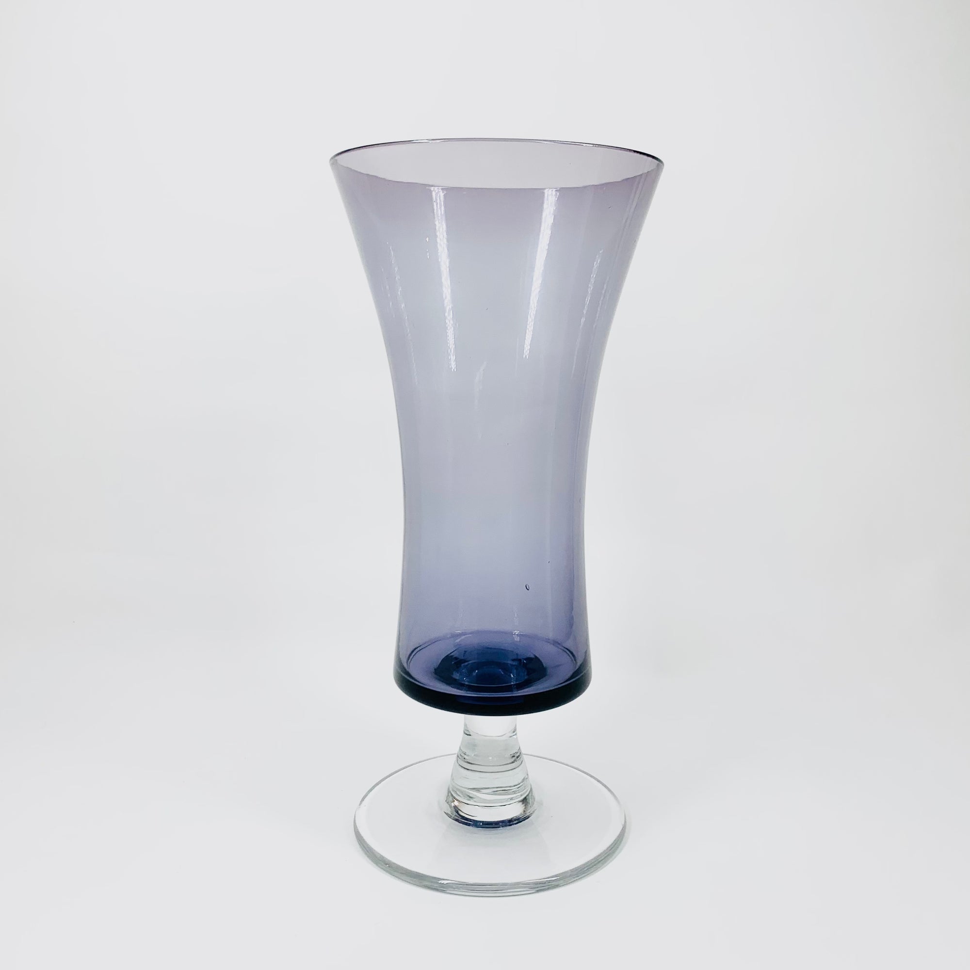 Midcentury Bohemian purple glass footed vase