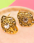 Extremely rare 1950s brass gilt clip on button earrings with clear rhinestones and filigree