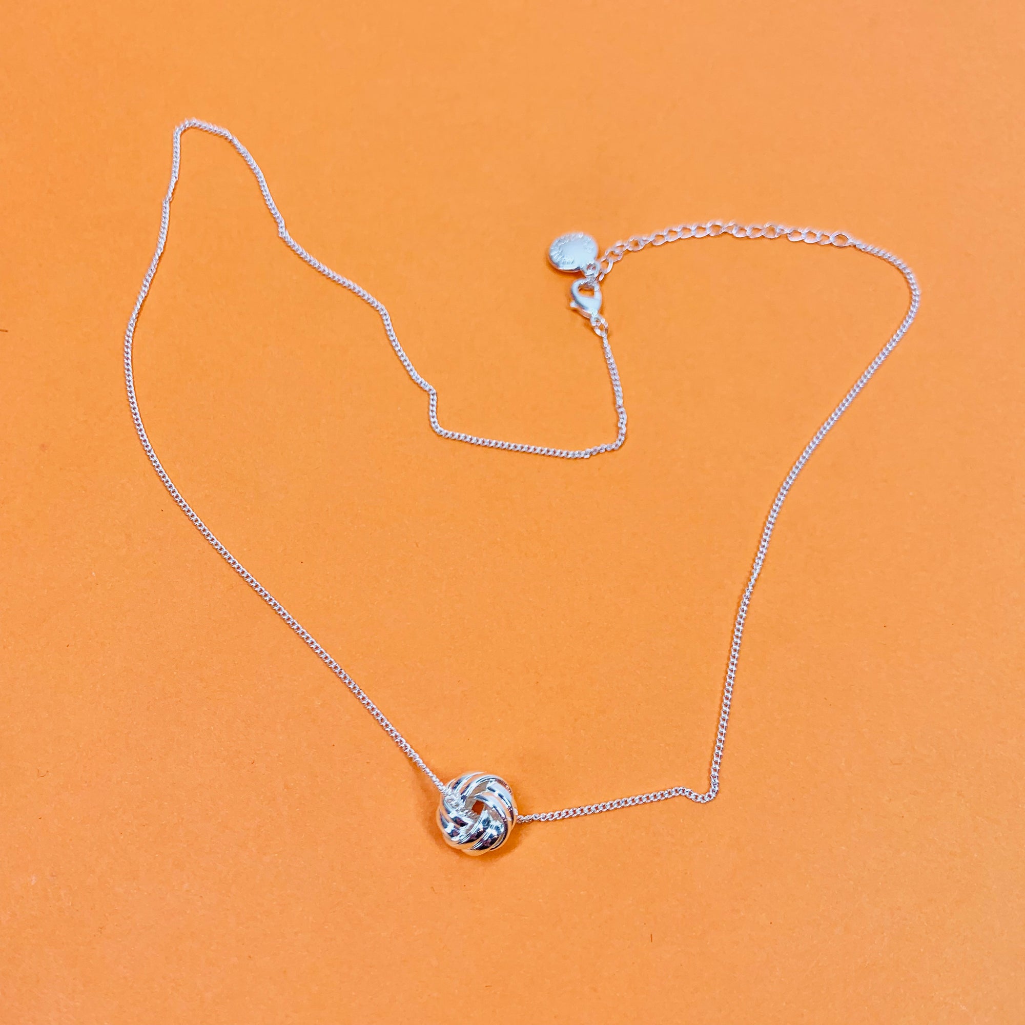 Vintage rose gold plated necklace with knot ball pendant