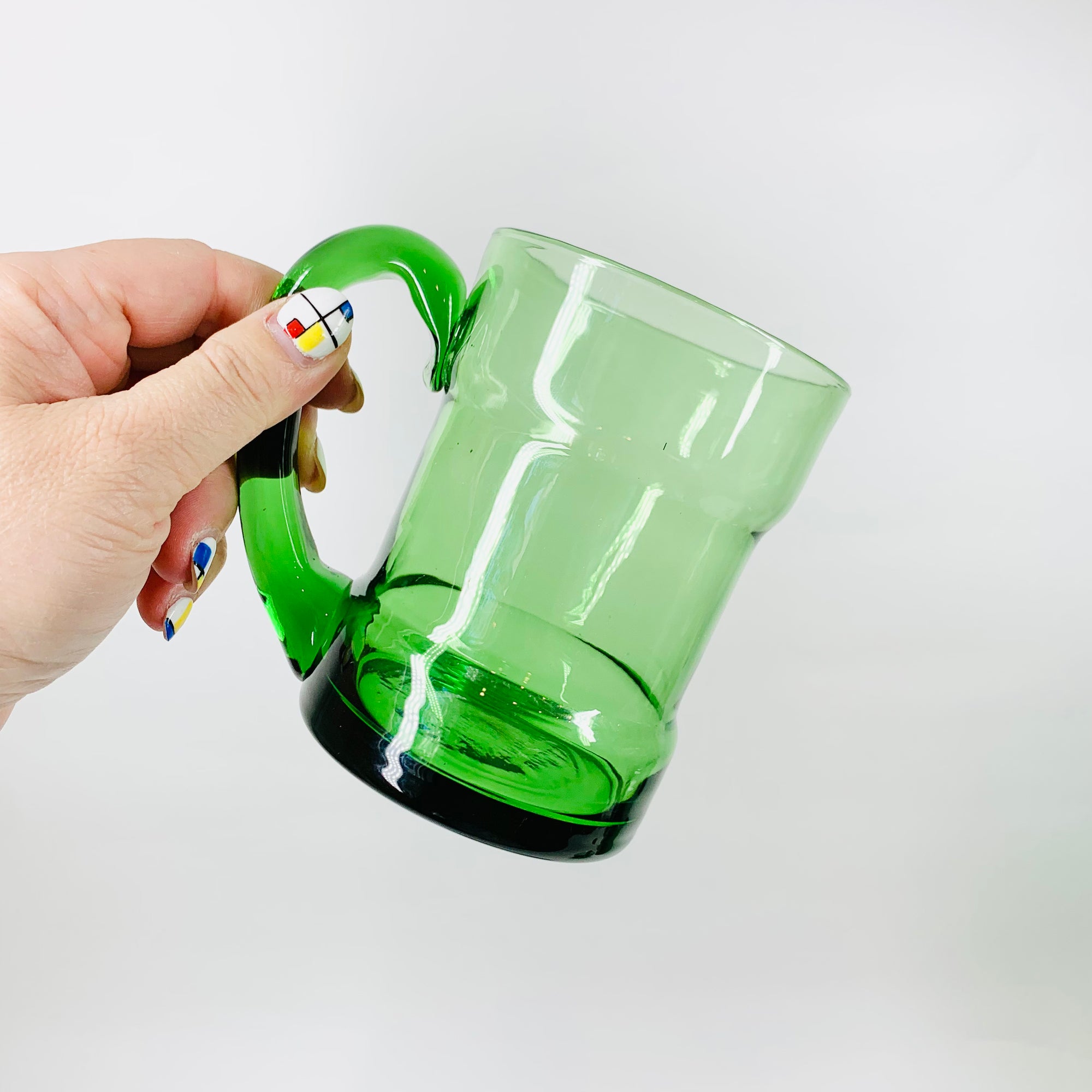 Rare Midcentury Italian green glass set with detachable leather sleeves