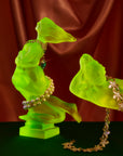 Art Deco reproduction of Lalique lie down Nude with star bangle cape figurine in uranium glass