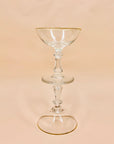 Antique crystal champagne coupe with gold gilding rim
