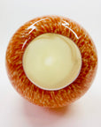 Vintage hand made orange cased art glass vase with abstract pattern
