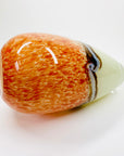 Vintage hand made orange cased art glass vase with abstract pattern
