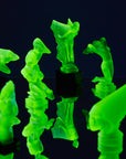 Art Deco reproduction of Lalique Nude with star bangle cape figurine in uranium glass